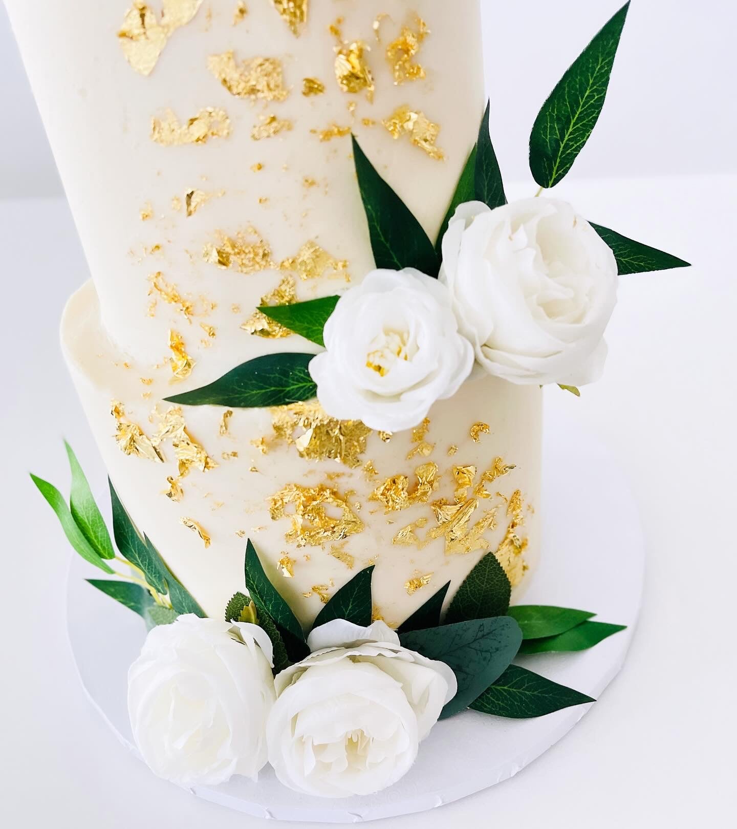 Two Tier White And Gold Floral Wedding Cake