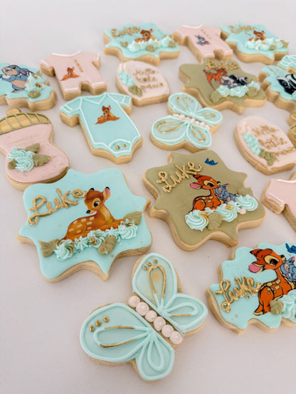 12 custom woodland animal sugar cookies for a Bambi-themed baby shower party.
Bambi-inspired sugar cookies arranged for a woodland-themed baby shower dessert table.