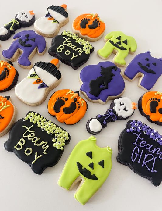 Spooky Halloween gender reveal cookies for a baby shower or gender reveal party