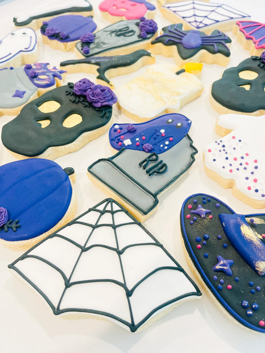 12 spooky Halloween sugar cookies individually wrapped and decorated with festive Halloween designs, available for nationwide shipping