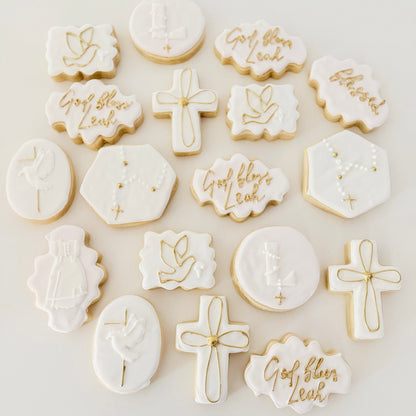 12 handmade baptism cookies decorated with elegant christening designs, perfect for baptism celebrations, party favors, and dessert tables.


Custom baptism sugar cookies in a 12-count set for christening celebrations and party favors.
Hand decorated baptism cookies with elegant religious designs for a special celebration.
12 decorated baptism cookies arranged for a christening dessert table.