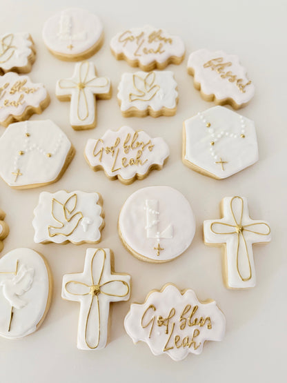 Custom baptism sugar cookies in a 12-count set for christening celebrations and party favors.
Hand decorated baptism cookies with elegant religious designs for a special celebration.
12 decorated baptism cookies arranged for a christening dessert table.
