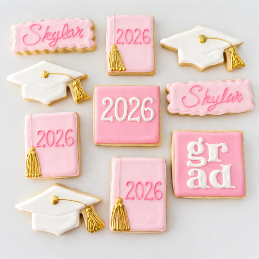 Custom graduation sugar cookies decorated in pink theme for Class of 2026 celebration
Handmade graduation cookies with royal icing and edible decorations for party dessert table
Pink graduation sugar cookies with cap and diploma designs for graduation party favors
Elegant custom decorated sugar cookies for graduation celebration dessert table
Fresno Gradution gift cookies.